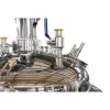 Heated mixing tank with sight glass jacket