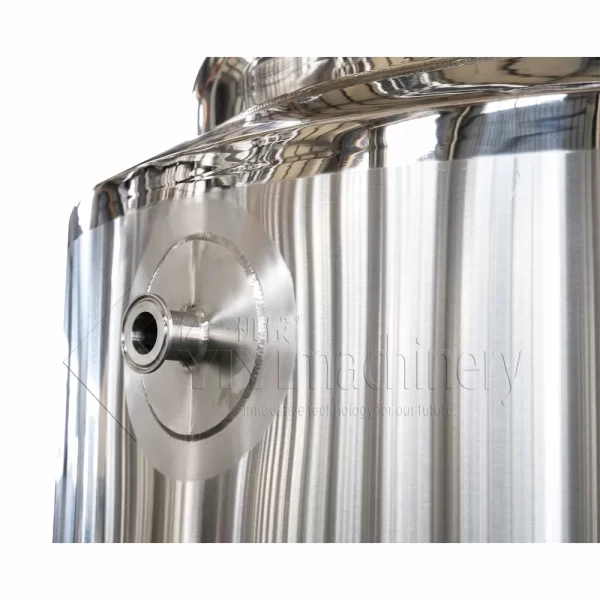 Heated mixing tank with sight glass jacket